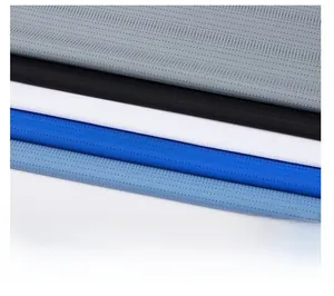 Detail view of breathable mesh fabric textures for men's casual shirts in multiple colors