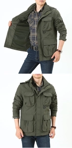 Detail of military green cargo jacket with flap pockets and adjustable velcro cuffs