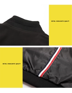 Detail view of black casual jacket with tri-color striped tape and ribbed knit collar