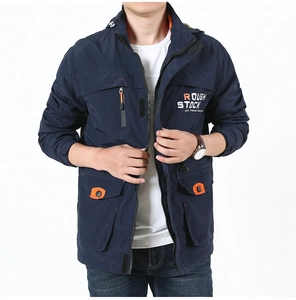Detail of navy outdoor jacket with orange zippers, multi-pockets and Rough Stock text