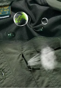 Close-up of military green outdoor jacket with mesh lining and smooth metal zipper detail