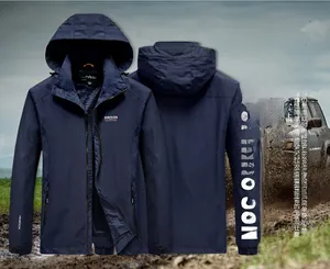 Detail of navy hooded outdoor jacket with adjustable velcro cuffs and windproof fabric