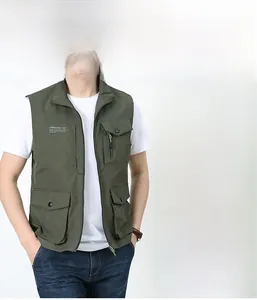 Detail of army green military utility vest with multiple pockets and stand collar