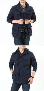 Detailed view of navy blue outdoor utility jacket with functional multi-pocket design