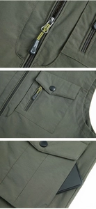 Detail of military green outdoor utility vest showing functional multi-pockets and fabric