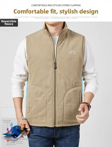 Close-up of khaki reversible polar fleece vest with Outdoor logo and side pockets
