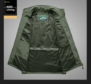 Detail view of breathable black mesh lining and inner security pockets of the vest