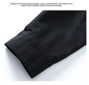 Detail of black men's long sleeve shirt showing precise double parallel stitching