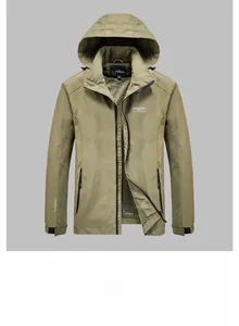 Detail of khaki outdoor jacket showing breathable mesh lining and zippered pocket