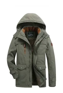Detail view of military green winter jacket with thick brown fleece lining and hooded design