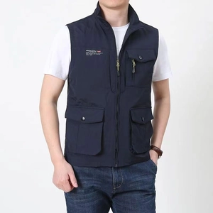 Men's navy blue outdoor utility vest with multi-pockets and freedom print on chest