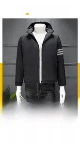Detail of waterproof black windbreaker featuring four grey stripes on the sleeve arm