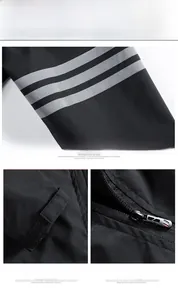 Detail of adjustable velcro cuffs and signature grey stripes on black windbreaker jacket