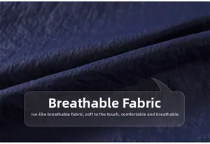 Close-up of dark blue ice silk fabric showing breathable seersucker texture and detail