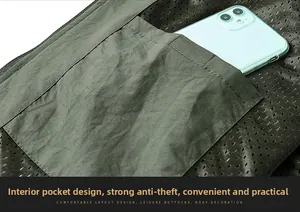 Detail of the internal anti-theft pocket with mesh lining for outdoor fishing vest