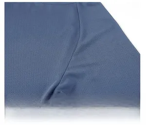 Macro shot of durable double-stitched seams on dark blue breathable mesh fabric
