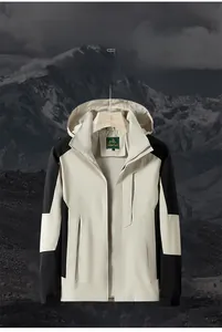 Close-up of beige and black outdoor windbreaker jacket with waterproof zippers