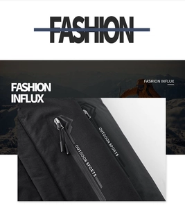 Détail de la fermeture éclair étanche sur veste outdoor noire avec lettrage blanc