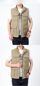 Détail du gilet de pêche kaki avec plusieurs poches et fermeture éclair frontale