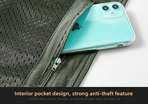 Detail of multi-pocket vest showing inner anti-theft pocket with secure metal zipper