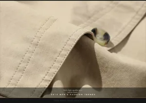 Detailed macro view of khaki premium 100% cotton fabric and marbled button on men jacket
