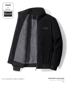 Detail view of black corduroy jacket with thick grey fleece lining and zipper closure