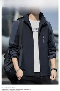 Outdoor waterproof windbreaker in black and grey patchwork with a hooded stand collar
