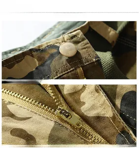 Detail of khaki camo cargo shorts showing metal zipper and retro button stitching