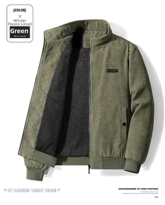 Detail of dark green corduroy jacket with thick black fleece lining and ribbed hem