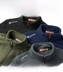 Macro view of four different fleece jackets showing chest embroidery and stand collar
