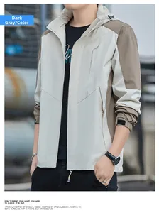 Detail of windproof men's jacket showing color block design and zip chest pocket