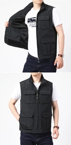 Détail du gilet noir multi-poches montrant la doublure en maille et le zip métal