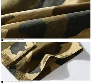 Detail of army green camouflage cargo shorts fabric showing durable stitching and twill texture