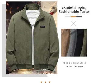 Detail of olive green corduroy jacket showing ribbed texture, zipper and color swatches