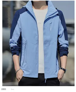 Detail of waterproof windbreaker showing sport logo and blue colorblock design