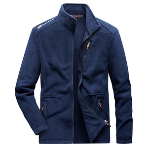 Men's navy polar fleece jacket with stand collar and orange zip pulls on a plain white background