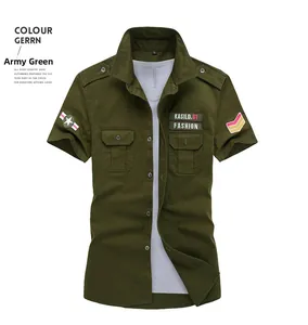 Detail of army green military short sleeve shirt featuring shoulder epaulettes and chest patches