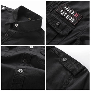 Detail view of black cargo shirt with embroidered patch, epaulettes and branded buttons