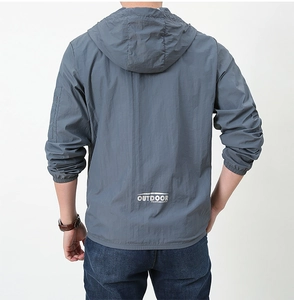 Detail of grey lightweight sun protection jacket back with OUTDOOR PROFESSIONAL text