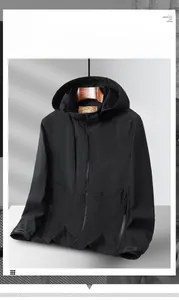 Close-up of windproof black outdoor jacket showing adjustable hood and zipper pockets