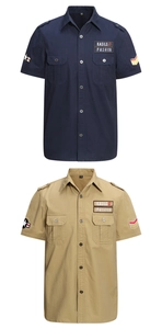 Detailed view of cargo shirts featuring epaulettes and embroidered chest badges