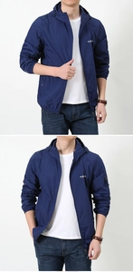 Detail shot of men's dark blue ice silk windbreaker with a functional sleeve zipper pocket
