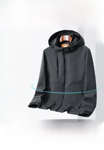 Detail of dark gray jacket showing 3D ergonomic cut and structured shoulder fit
