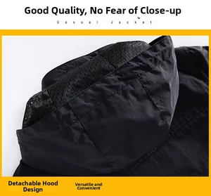 Detail view of the detachable hood with breathable mesh lining on the black windbreaker