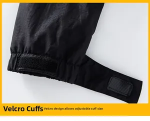 Detailed close-up of adjustable velcro cuffs on a windproof black outdoor jacket