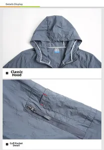 Detail of hooded windbreaker featuring functional zip sleeve pocket with sports label