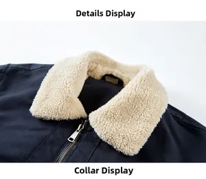 Detail view of the navy workwear jacket featuring a soft beige sherpa-lined collar