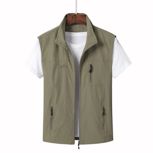 Men's outdoor utility vest with zipper pockets and embroidered outdoor logo in green