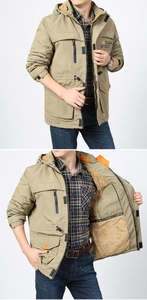 Detail view of khaki hooded jacket with warm fleece lining and multiple pockets