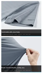 Detail of grey quick-dry fabric showing breathable micropores and elastic stretch performance
